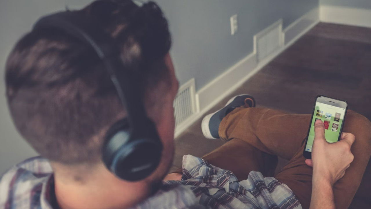 Man listening to audiobooks.