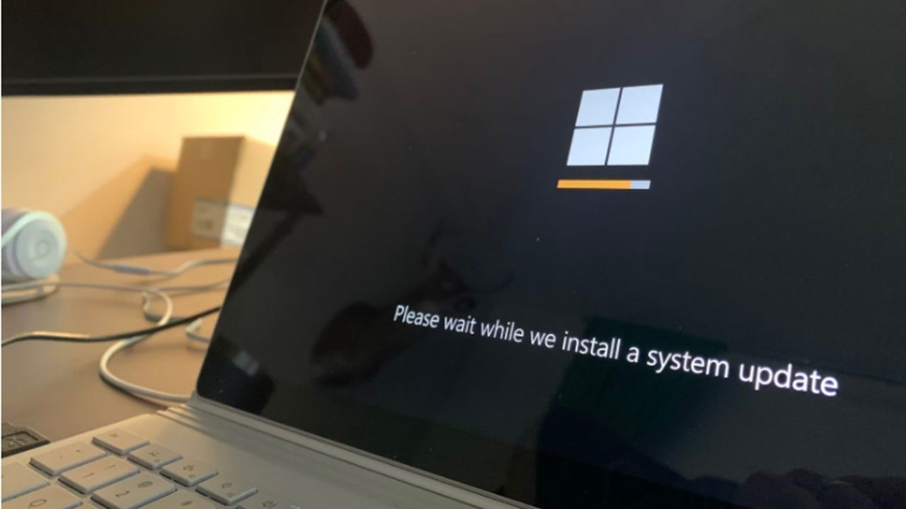 Laptop performing a Windows update.