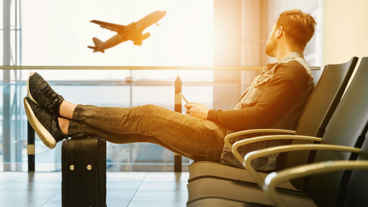 Person Looking At An Airplane