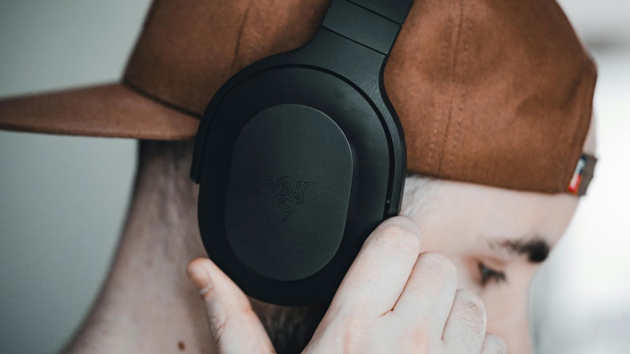 Side image of man with headphones