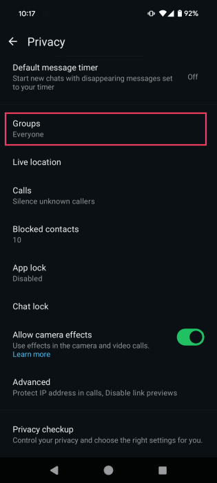 Tapping on Groups option in WhatsApp Privacy section on Android phone.
